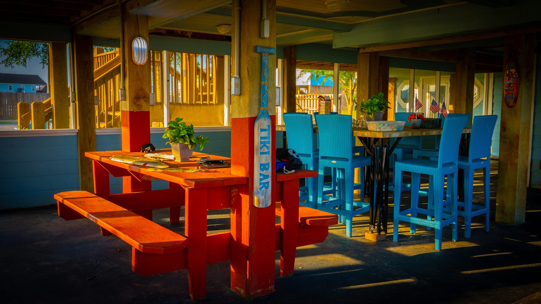 covered community seating and tiki bar area at The Palms RV Resort